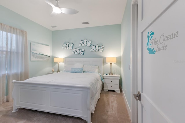 carpeted bedroom with ceiling fan