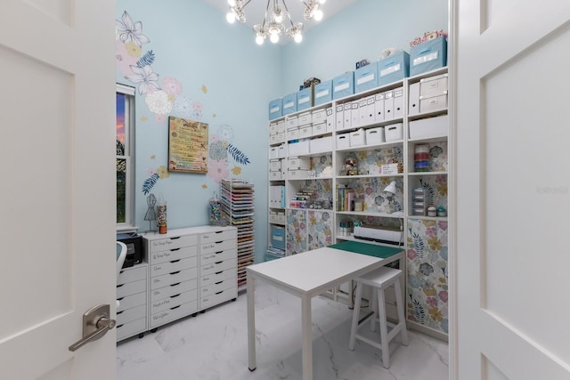 office area featuring an inviting chandelier