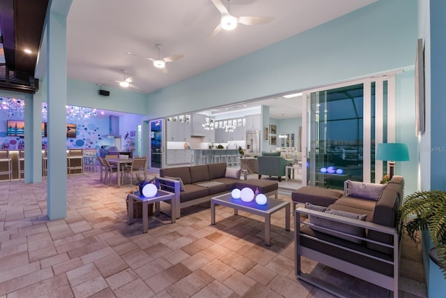 view of patio featuring outdoor lounge area and ceiling fan