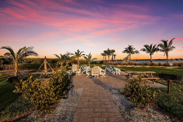 view of patio terrace at dusk