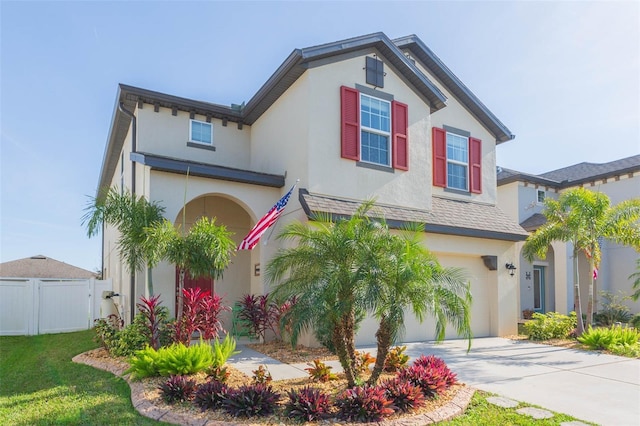 view of front of home with a garage