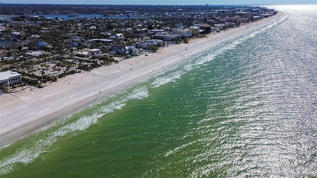 bird's eye view featuring a beach view and a water view