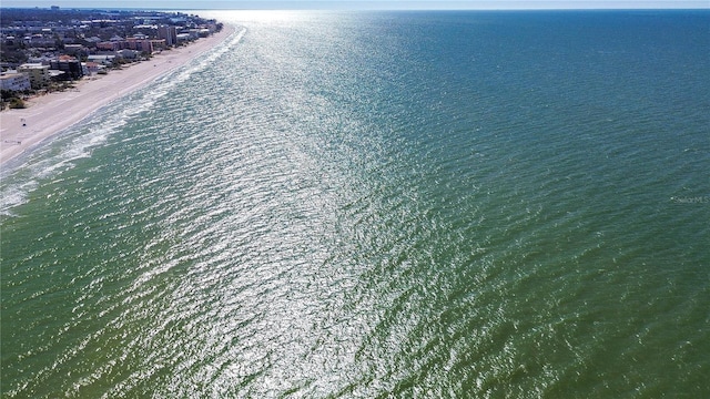 bird's eye view with a water view and a view of the beach