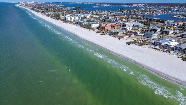 drone / aerial view featuring a view of the beach and a water view