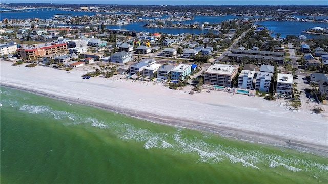 drone / aerial view with a water view and a view of the beach