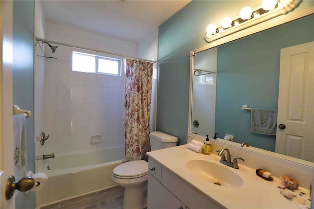 full bathroom with wood-type flooring, toilet, shower / tub combo, and vanity