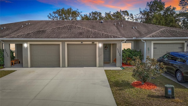 ranch-style home with a garage