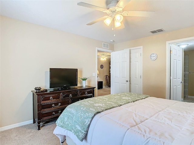 bedroom featuring light carpet and ceiling fan