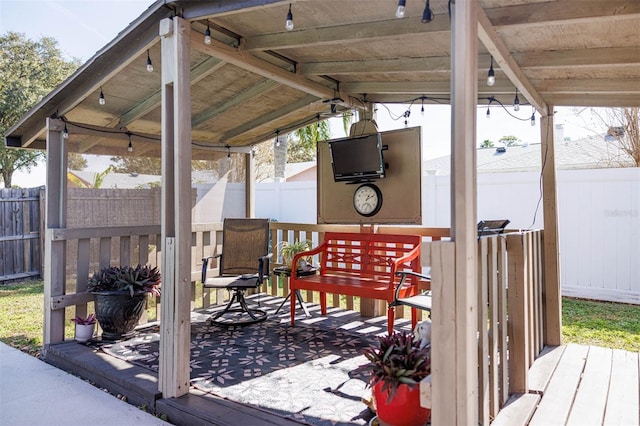 wooden deck featuring fence