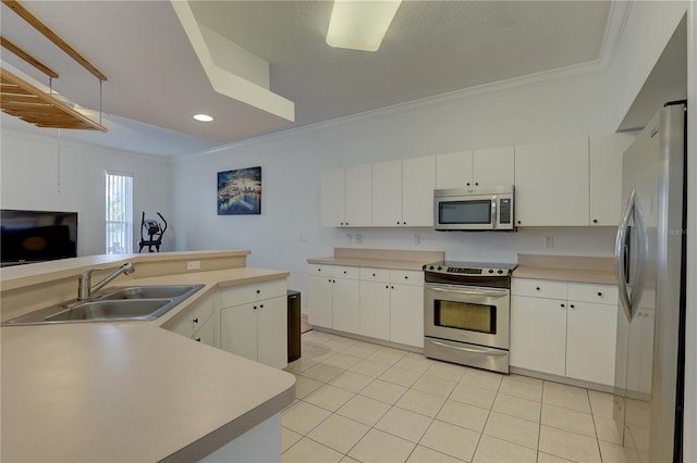 kitchen featuring light tile patterned floors, crown molding, sink, appliances with stainless steel finishes, and white cabinetry