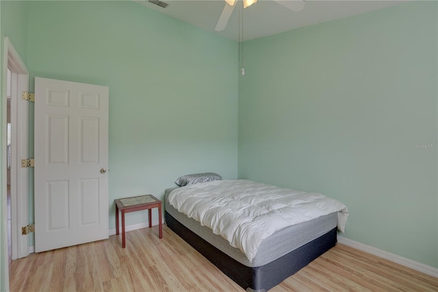 bedroom featuring ceiling fan and light wood-type flooring