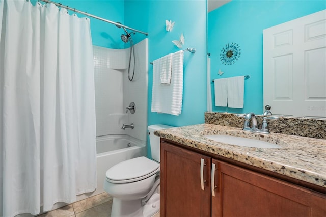 full bathroom featuring vanity, tile patterned floors, shower / bath combo with shower curtain, and toilet