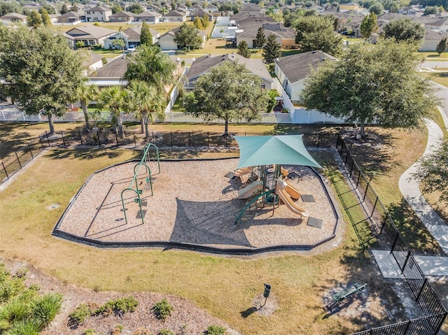 birds eye view of property with a residential view