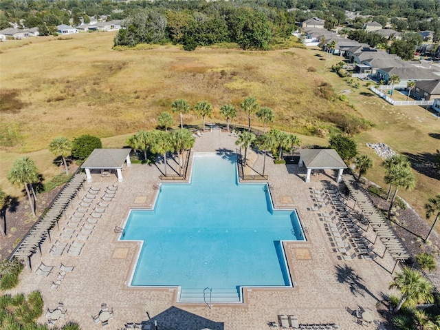 view of pool featuring a gazebo and fence