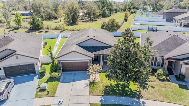 birds eye view of property with a residential view