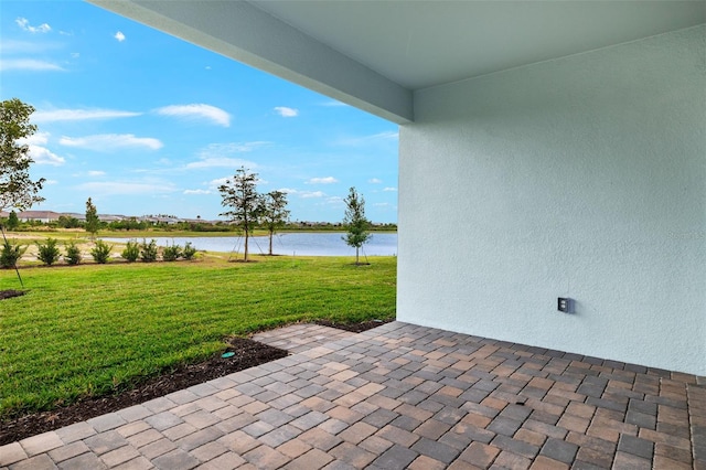 view of patio / terrace featuring a water view