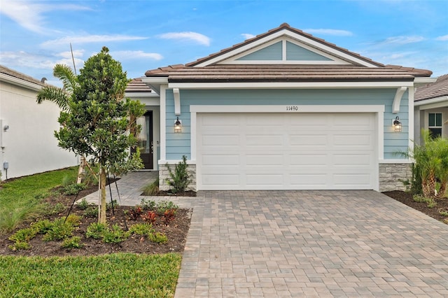 single story home featuring a garage