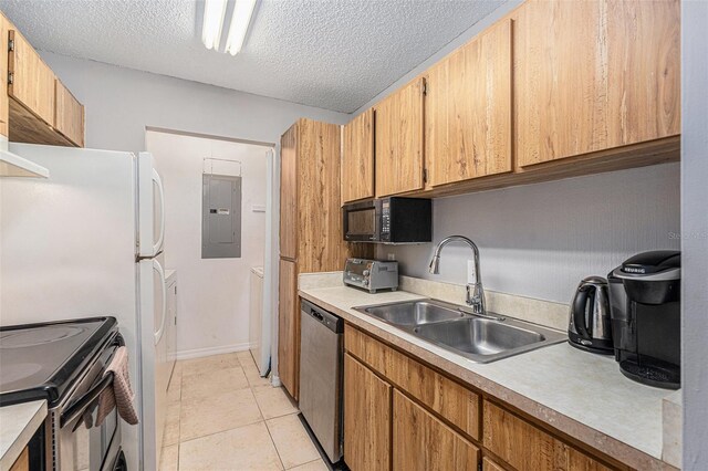 455 Alt 19 S Unit 268, Palm Harbor, FL 34683 - kitchen with black microwave, dishwasher, electric panel, electric range oven, and light countertops