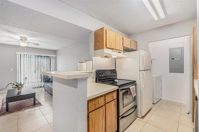 455 Alt 19 S Unit 268, Palm Harbor, FL 34683 - kitchen with under cabinet range hood, electric panel, stainless steel range with electric stovetop, a textured ceiling, and washer / dryer
