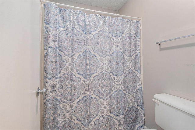 455 Alt 19 S Unit 268, Palm Harbor, FL 34683 - full bathroom with a shower with shower curtain and a textured ceiling