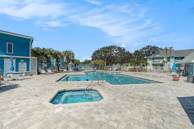 455 Alt 19 S Unit 268, Palm Harbor, FL 34683 - community pool featuring a community hot tub and a patio