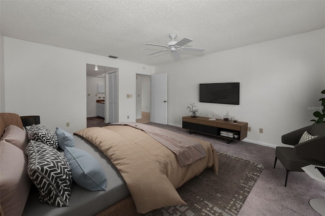 bedroom featuring baseboards, visible vents, a ceiling fan, carpet, and a textured ceiling