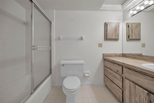 full bathroom with toilet, enclosed tub / shower combo, vanity, tile patterned flooring, and baseboards