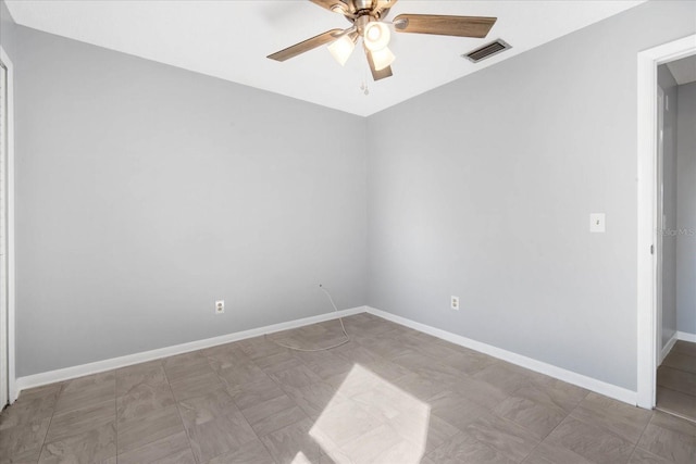 spare room featuring ceiling fan