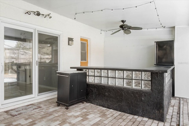 view of patio with ceiling fan