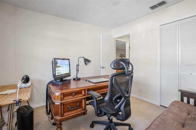 view of carpeted office space