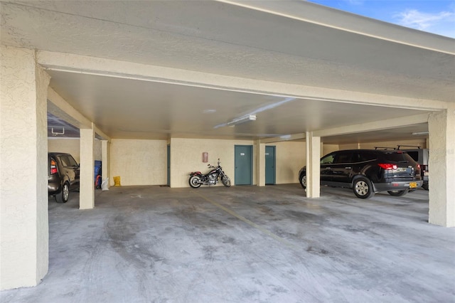 garage with a carport