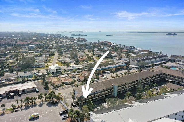 birds eye view of property featuring a water view