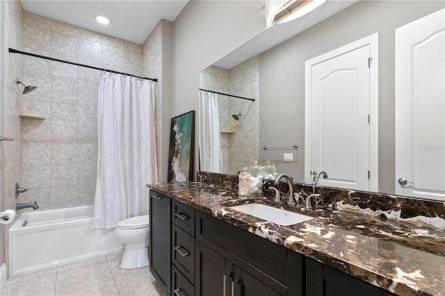 full bathroom with vanity, tile patterned floors, shower / bath combination with curtain, and toilet