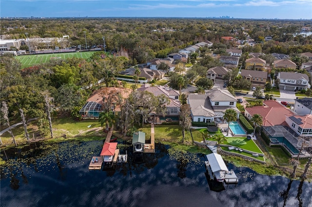 birds eye view of property featuring a water view