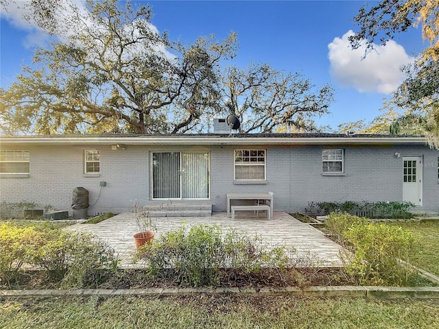 back of house featuring a patio area