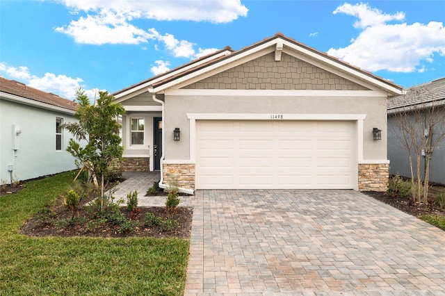 view of front of property with a garage