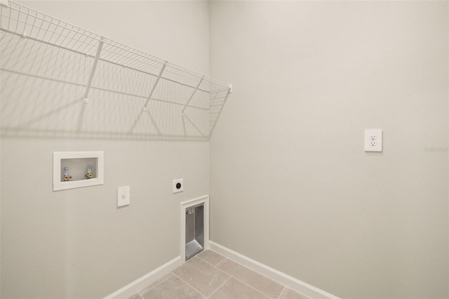 laundry room with light tile patterned flooring, hookup for an electric dryer, and hookup for a washing machine