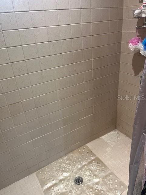 bathroom featuring walk in shower