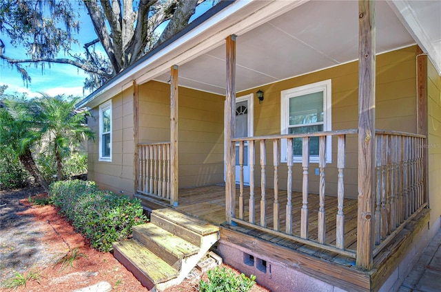 entrance to property with a porch