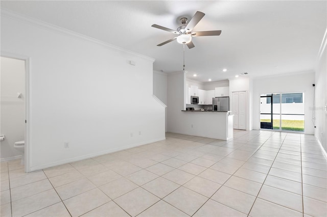 unfurnished living room with ornamental molding, light tile patterned floors, and ceiling fan