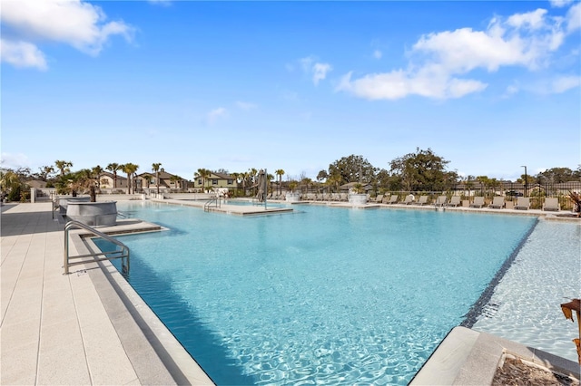 view of swimming pool featuring a patio