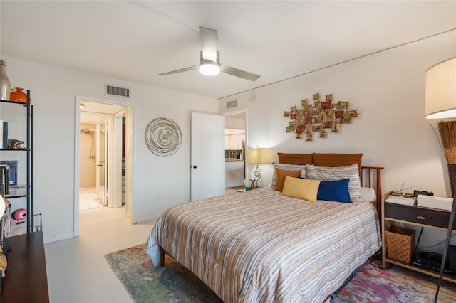 bedroom with ceiling fan and ensuite bath