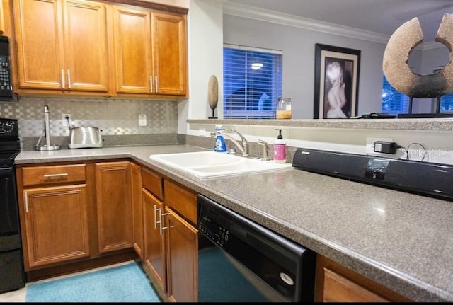 kitchen with crown molding, sink, decorative backsplash, and black appliances