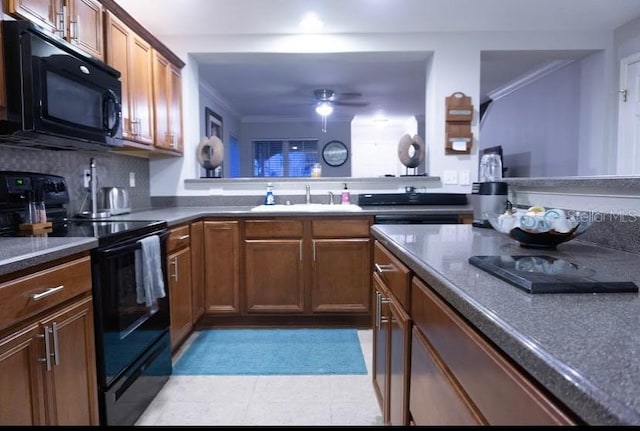 kitchen featuring sink, decorative backsplash, ceiling fan, black appliances, and crown molding