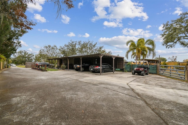 view of car parking with a carport