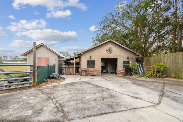 view of front of home with an outbuilding