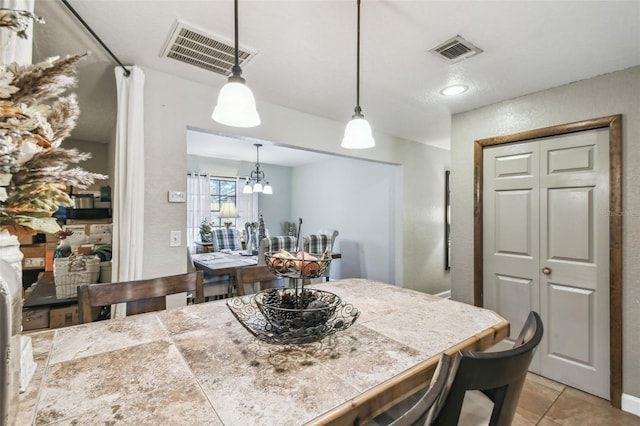 view of tiled dining space