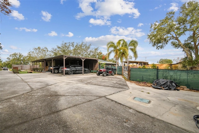 exterior space featuring a carport