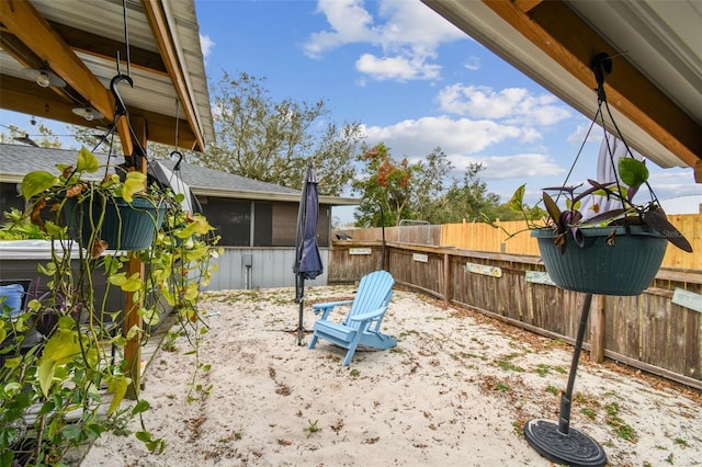 view of yard featuring a sunroom