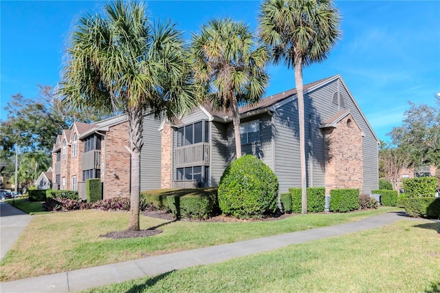 exterior space with a lawn